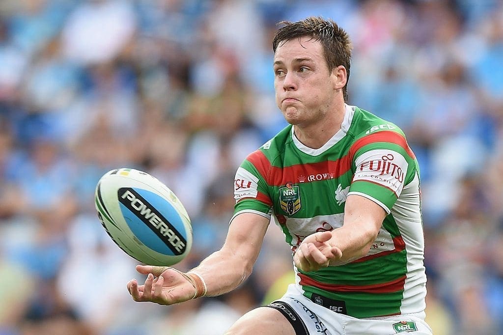 GOLD COAST, AUSTRALIA - MAY 30: Luke Keary of the Rabbitohs passes the ball during the round 12 NRL match between the Gold Coast Titans and the South Sydney Rabbitohs at Cbus Super Stadium on May 30, 2015 on the Gold Coast, Australia. (Photo by Matt Roberts/Getty Images)