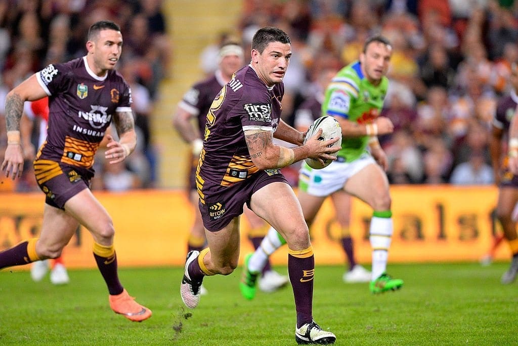 BRISBANE, AUSTRALIA - JUNE 09: Matt Gillett of the Broncos runs with the ball during the round 14 NRL match between the Brisbane Broncos and the Canberra Raiders at Suncorp Stadium on June 9, 2016 in Brisbane, Australia. (Photo by Bradley Kanaris/Getty Images)