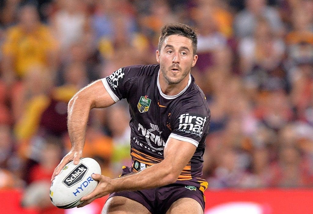 BRISBANE, AUSTRALIA - MARCH 11: Ben Hunt of the Broncos passes the ball during the round two NRL match between the Brisbane Broncos and the New Zealand Warriors at Suncorp Stadium on March 11, 2016 in Brisbane, Australia. (Photo by Bradley Kanaris/Getty Images)